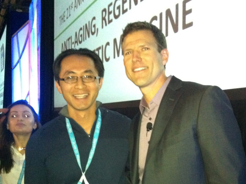 Dr John Tang with Dr. Travis Stork